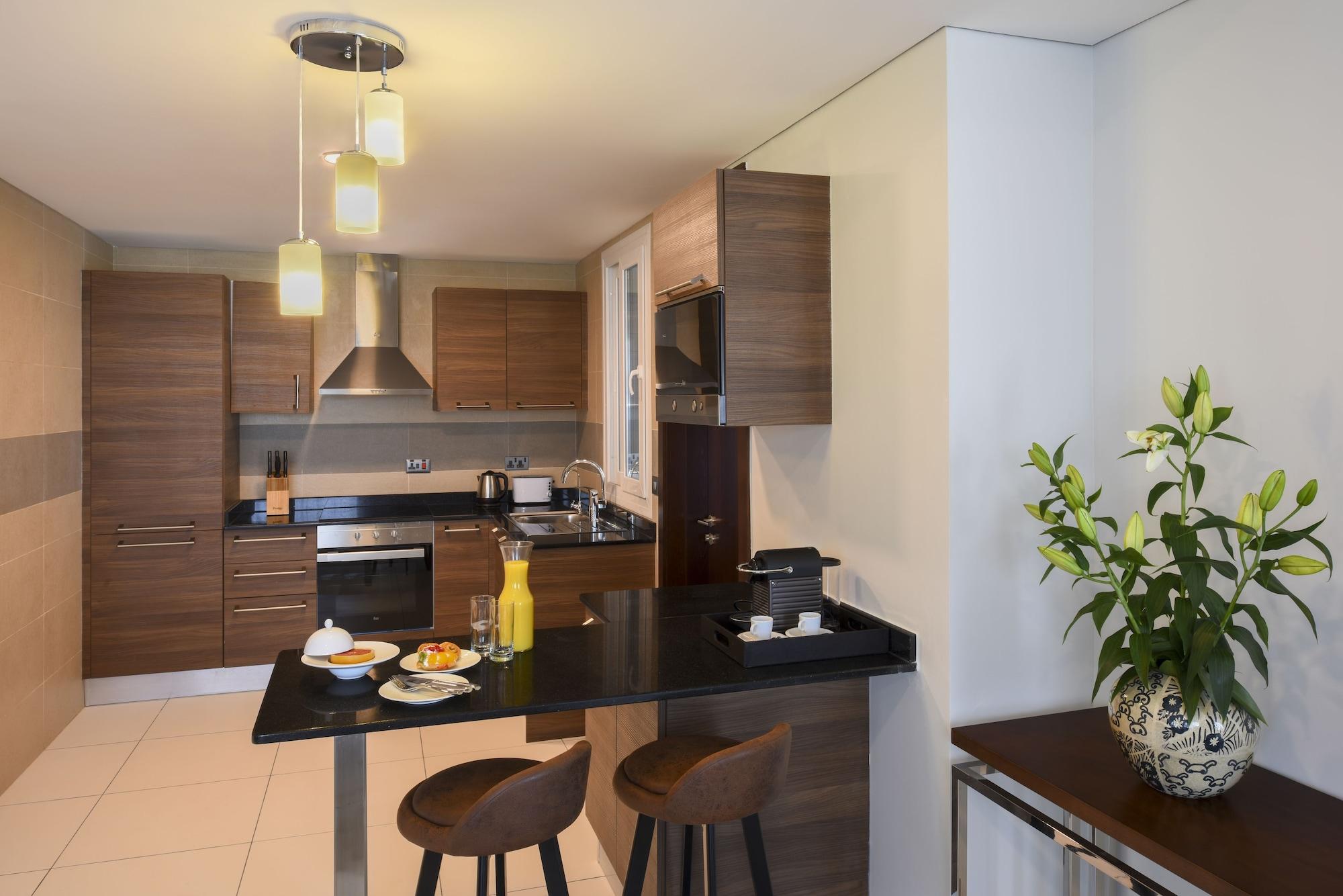 Fraser Suites Maskat Exterior foto A kitchen