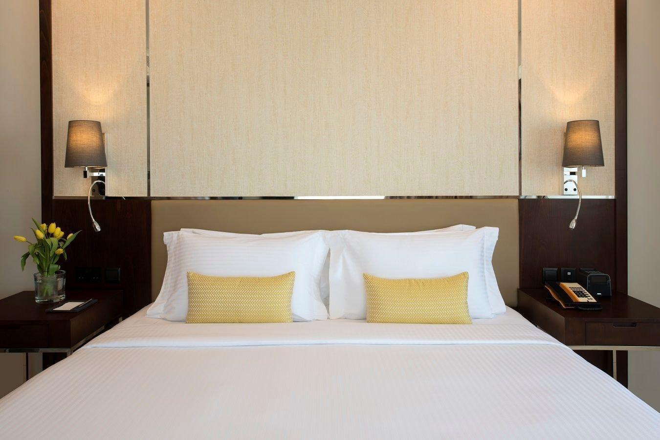 Fraser Suites Maskat Exterior foto A bedroom at the hotel