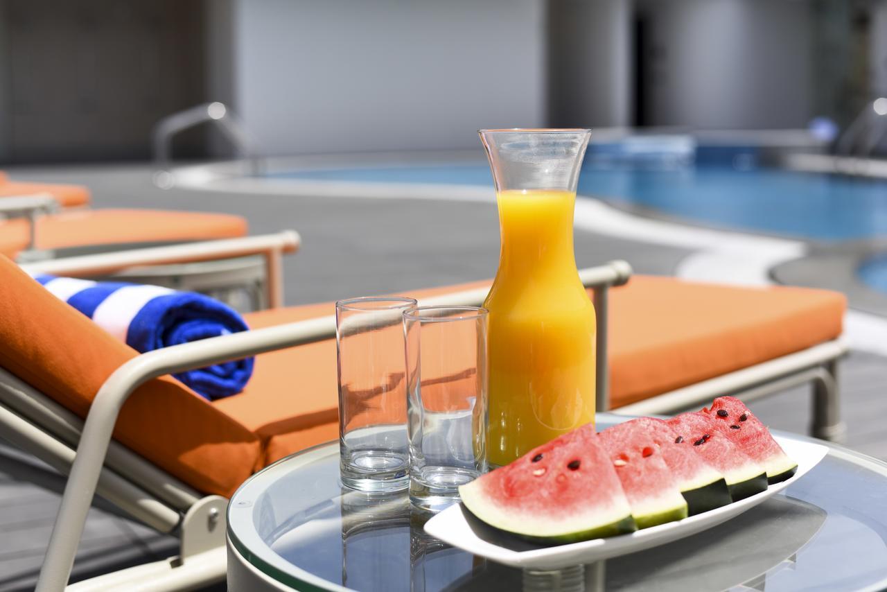 Fraser Suites Maskat Exterior foto A bottle of orange juice